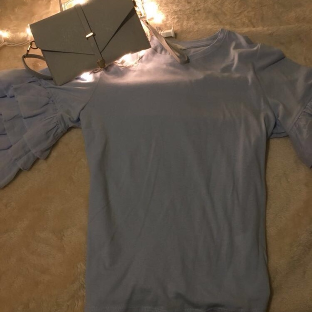 Light blue shirt with flare sleeves